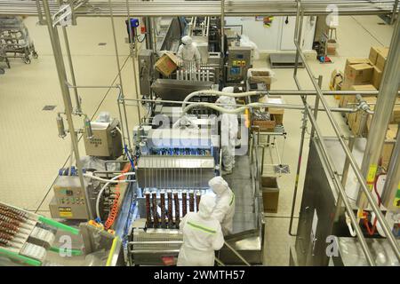 TAICANG, CHINA - FEBRUARY 27, 2024 - Workers work on the production line at the world's first ice cream 'Lighthouse Network' Unilever Wall's productio Stock Photo