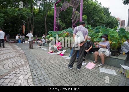 People’s Park Matchmaking Market, where parents exchange information in the hope of helping their children find a suitable partner Stock Photo