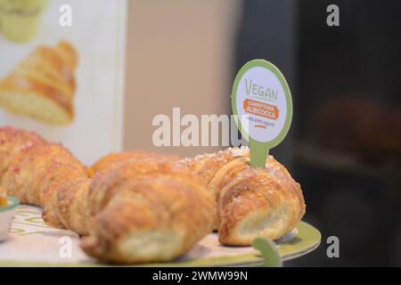 A variety of vegan croissant displayed in a bakery window Stock Photo