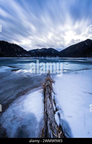 A Frozen mountain lake in Chiemgau, Bavaria, Germany Stock Photo