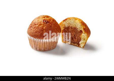 Whole and sliced freshly baked soft fluffy muffins filled with sweet apple jam, isolated on white background Stock Photo