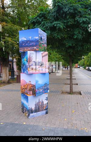 A stack of large photo, picture cubes that display many of the citiy's famous landmarks. Part of the annual apple festival in Almaty, Kazakhstan. Stock Photo
