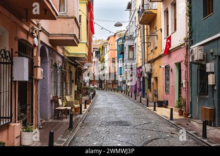 Balat district street view in Istanbul. Balat is popular tourist attraction in Istanbul, Turkey. Colorful decorated houses along Street in Istanbul Ol Stock Photo