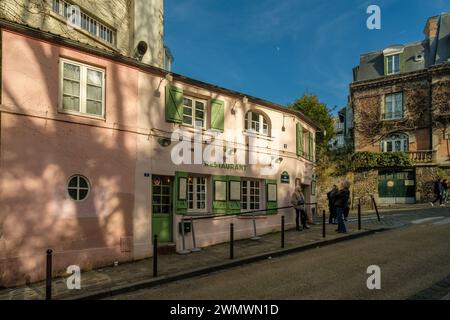 Paris, France - February 17, 2024 : View of the picturesque area of Montmartre and the famous pink restaurant, La Maison Rose, in Paris France Stock Photo