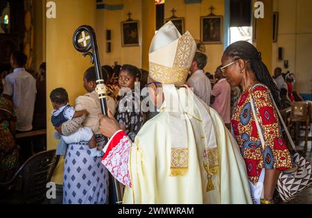 Catholic Bishop Augustine Shao arrives in St Joseph's Cathedral for Sunday Mass in Stone Town, Zanzibar, Tanzania. Stock Photo