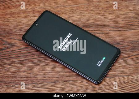 Palembang, Indonesia, February 28, 2024: Samsung Galaxy Android boot loading is visible on the smartphone screen. Stock Photo