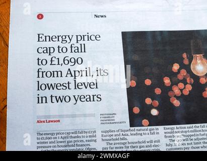 'Energy price cap to fall to £1,690 from April, it's lowest level in two years' Guardian newspaper article cost of living article 24 Feb 2024 UK Stock Photo