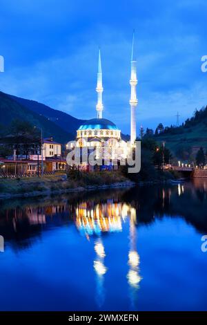 Uzungol mosque reflecting in the lake at sunset, Trabzon, Turkey Stock Photo