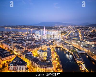 Geneva, Switzerland skyline view towards the Jet d'Eau fountain in Lake Geneva at twilight. Stock Photo