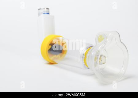 Closeup of a spacer, asthma inhaler isolated on white background and copy space Stock Photo