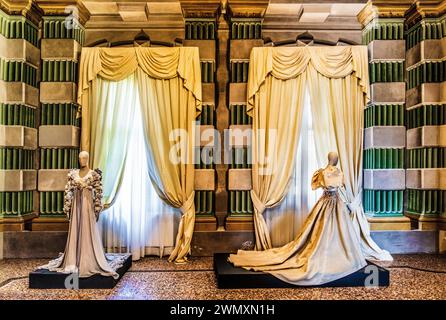 Right Wedding dress made of silk organza, embroidered with appliqued fabric flowers, 1983, exhibition of magnificent evening dress creations by Stock Photo