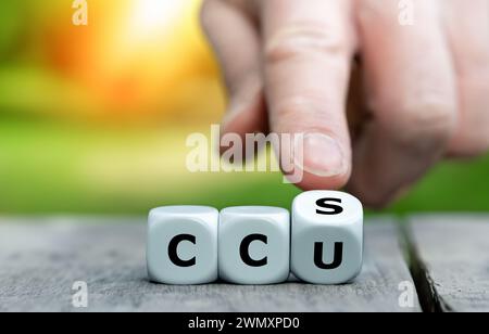 Cubes form the expression CCU (carbon capture utilization) and CCS (carbon capture storage). Stock Photo