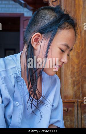 Vietnam, Mekong Delta, Kien Giang province, Ha Tien, young nun in Phat Da pagoda or Brick Kiln Buddhist pagoda Stock Photo