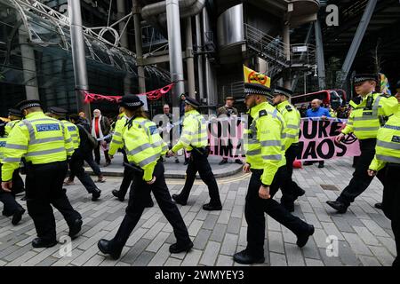 City of London, London, UK. 28th Feb 2024. Extinction Rebellion stage actions against insurance companies. XR surround Lloyds building.  Credit: Matthew Chattle/Alamy Live News Stock Photo