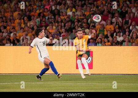 Melbourne, Australia. 29th Feb, 2024. Steph Catley of Australia and Sevinch Kuchkorova of Uzbekistan in action during the AFC Women's Paris 2024 Olympic Qualifier Round 3 match between Australia and Uzbekistan at Marvel Stadium. Australia won the match 10-0. Credit: SOPA Images Limited/Alamy Live News Stock Photo