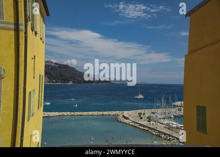 Panoramic view of Mediterranean sea and beach from the top of church in old town of Menton, France Stock Photo