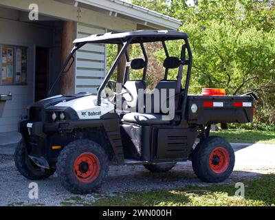 Miami, Florida, United States - January 27, 2024: Bobcat vehicle for park maintenance (Oleta River State Park). Stock Photo