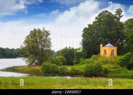 The little gazebo or summer house overlooking the lake on the estate of Crom Castle on Upper Lough Erne in County Fermanagh, Northern Ireland. Stock Photo