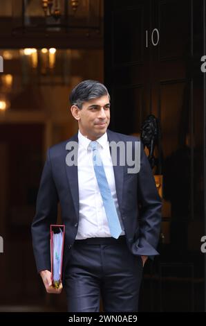 Rishi Sunak, exiting Number 10 Downing Street to got to PMQs on February 28th 2024, Westminster, UK Stock Photo