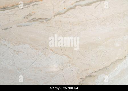 Textured, warm toned, natural marble stone surface Stock Photo