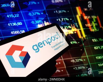 Konskie, Poland - February 24, 2024: Genpact company logo displayed on mobile phone Stock Photo