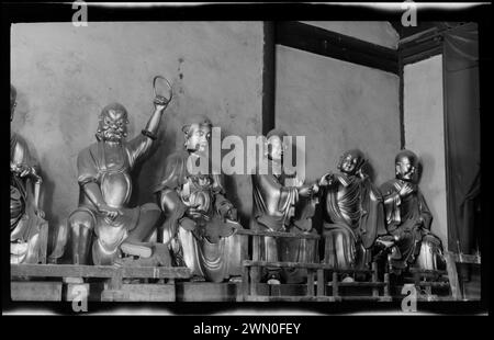 Bronze painted figures in new temple at Nanking. Bronze painted figures in new temple at Nanking Stock Photo