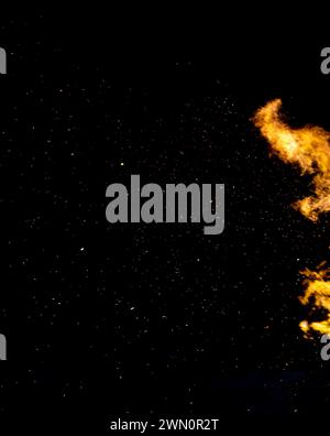 Burning red hot flying sparks fire in the night sky illustration Stock ...
