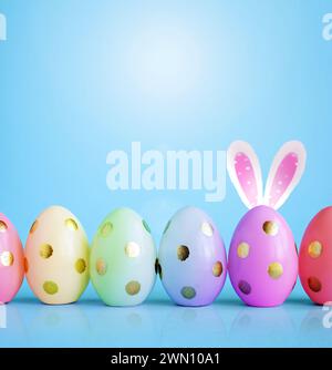 Collection of stylish colors eggs with golden circles for Easter celebration on blue background. Holiday concept. Stock Photo