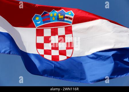Croatia flag waving in the wind blue sky on background Stock Photo