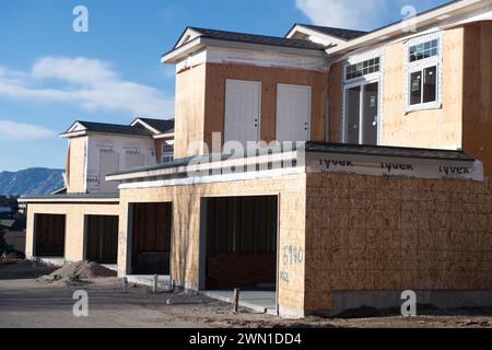 Duplexes and townhomes under construction in the Rockrimmon area of northern Colorado Springs, Colorado.  Large two car garages are featured. Stock Photo