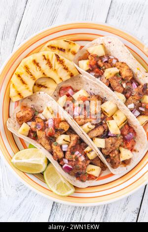 Tacos al pastor mexican dish with pork and pineapple Stock Photo