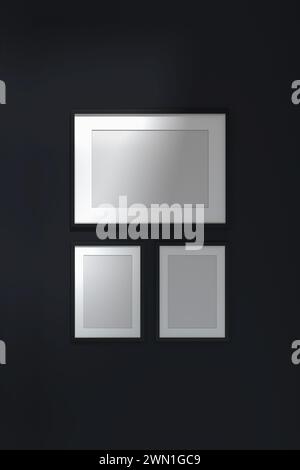 Mockup poster frames on black wall. 3d rendering. Stock Photo