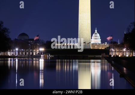 Reflections of the Washington Monument and Capitol Building in DC Stock Photo