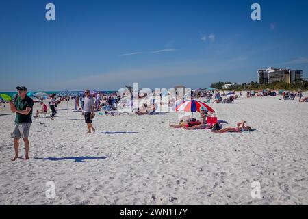 USA Florida FL Sarasota Lido Beach on Lido Key by the Gulf of Mexico  People enjoying the sun sand and blue waters Stock Photo
