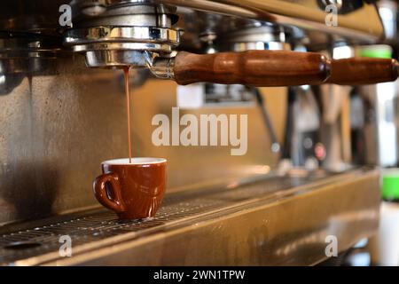 Food Drink An espresso machine making an espresso coffee in a cafe Stock Photo
