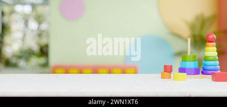A presentation space on a white desk features kids' toys with a blurred background of a colorful kid's room or kindergarten classroom. 3d render, 3d i Stock Photo