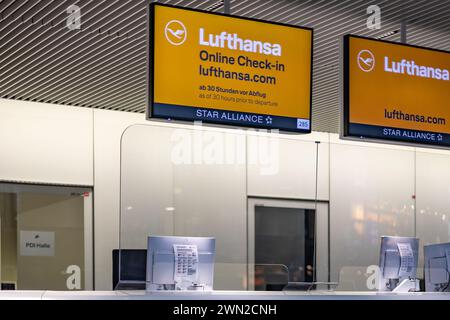 Frankfurt Airport, Germany - February 19, 2024: an empty Lufthansa check-in desk at the Frankfurt International Airport Stock Photo