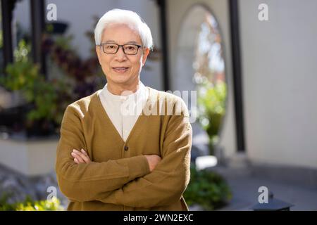 Senior Man in Classical Garden Stock Photo