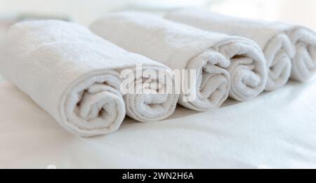 White towels in a line Stock Photo