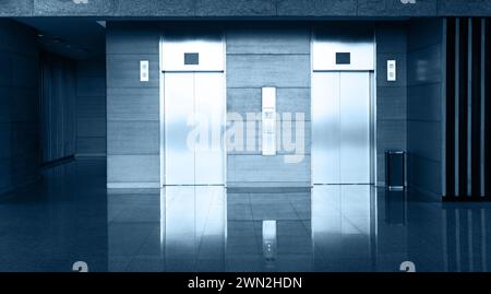 Two elevator doors in luxurious building Stock Photo