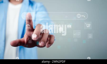 Businessman Search On Virtual Screen Data Search Technology Search Engine Optimization. Man use search engine to Searching for information. Using web Stock Photo