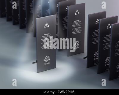 Spotlit spare smartphone battery standing out among the crowd. 3D illustration. Stock Photo