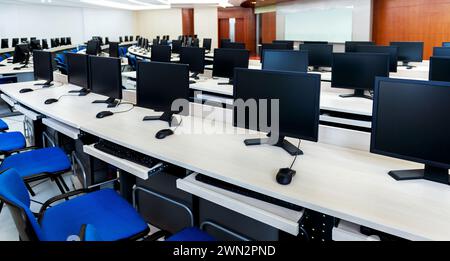 Group of computers neatly placed in a lab Stock Photo