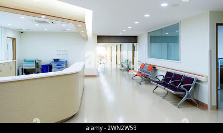 Empty nurses station and corridor in a hospital Stock Photo