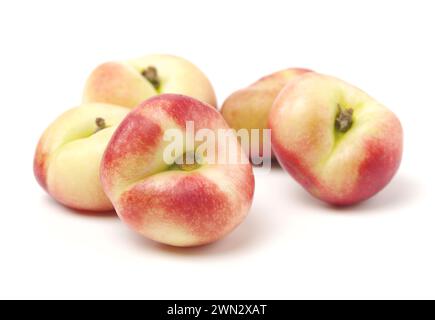 chinese flat peaches on white background Stock Photo