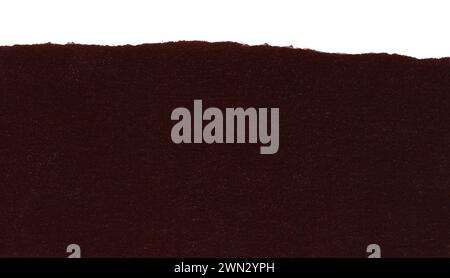 Torn dark paper. Carton ripped border, edge, frame. Torn cardboard empty brown background, realistic grainy texture. Ragged design element isolated Stock Photo