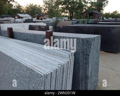 The gray granite slabs in an outdoor setting Stock Photo