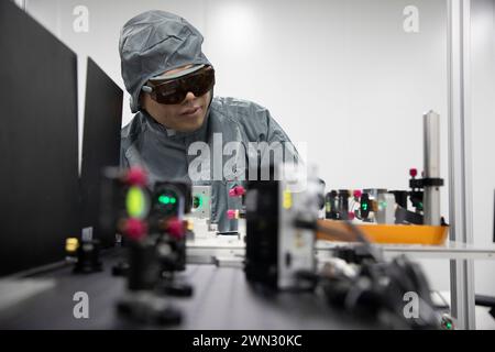 (240229) -- BEIJING, Feb. 29, 2024 (Xinhua) -- Yang Xiaojun checks experiment progress at a laboratory of MICROMACH in Xi'an, northwest China's Shaanxi Province, Jan. 17, 2024. Yang Xiaojun is director of the Photonic Manufacturing Systems and Application Research Center of Xi'an Institute of Optics and Precision Mechanics, Chinese Academy of Sciences (CAS). He was employed by the institute after graduating with a Ph.D degree in 2008, and led his team to incorporate the MICROMACH company in 2015 to speed up the industrial application of his achievements in ultra-fast laser manufacturing resea Stock Photo