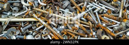 Panorama Rusty screws, nuts and nails Stock Photo