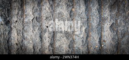 The Granite cobblestoned pavement background. Selective focus Stock Photo